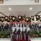 Ketua IBI Cabang Tanah Datar Osninelli bersama Sekda Abdurrahman Hadi dalam acara pelantikan 26 pengurus ranting IBI di Aula Kantor Bupati Tanah Datar